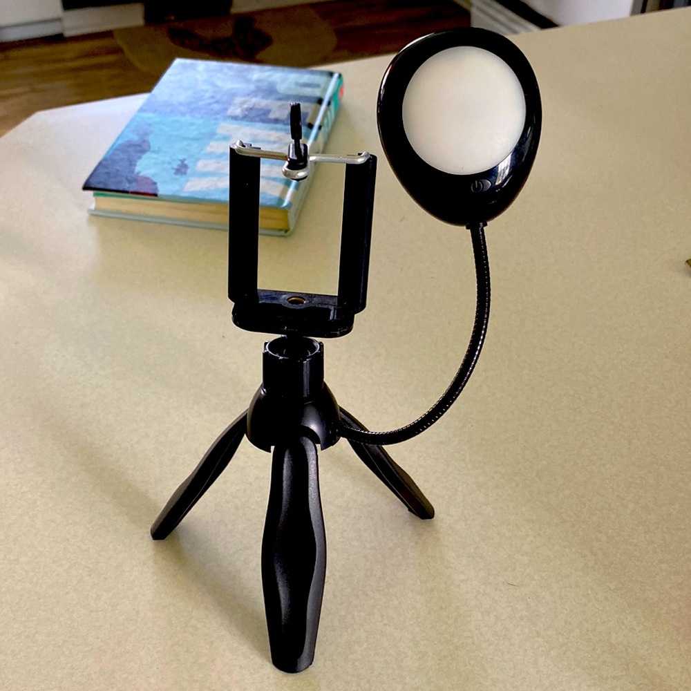 Phone stand with light